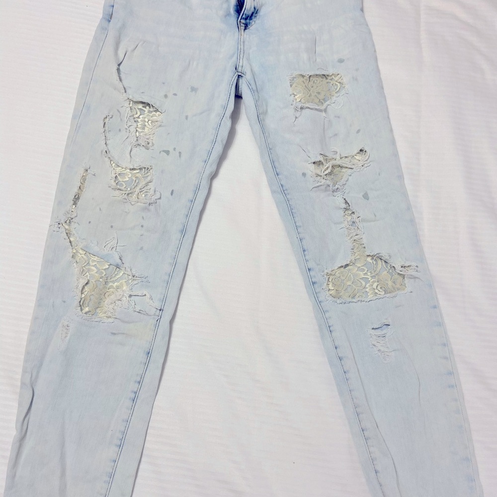 Forever21 Ripped and spotted jeans with lace insert